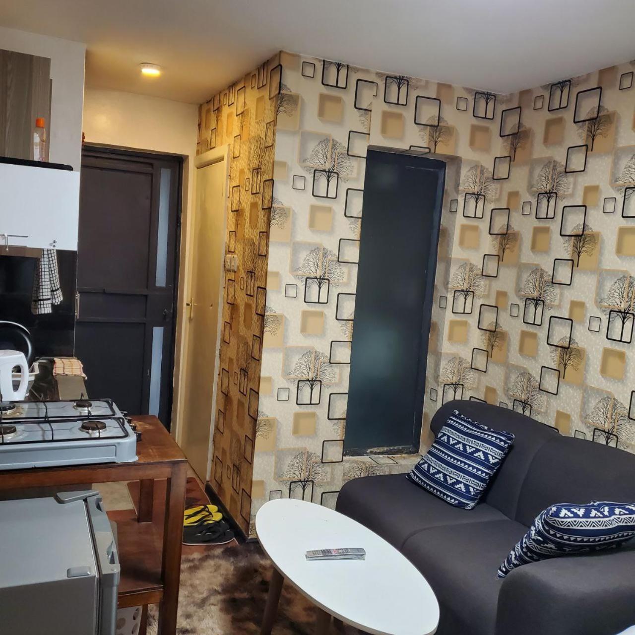 Lovely & Cozy Compact Studio Near Airport With Rooftop View Daire Nairobi Dış mekan fotoğraf