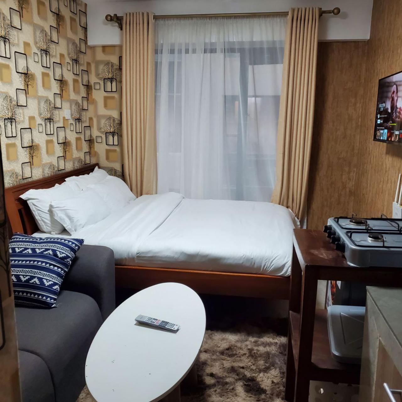 Lovely & Cozy Compact Studio Near Airport With Rooftop View Daire Nairobi Dış mekan fotoğraf