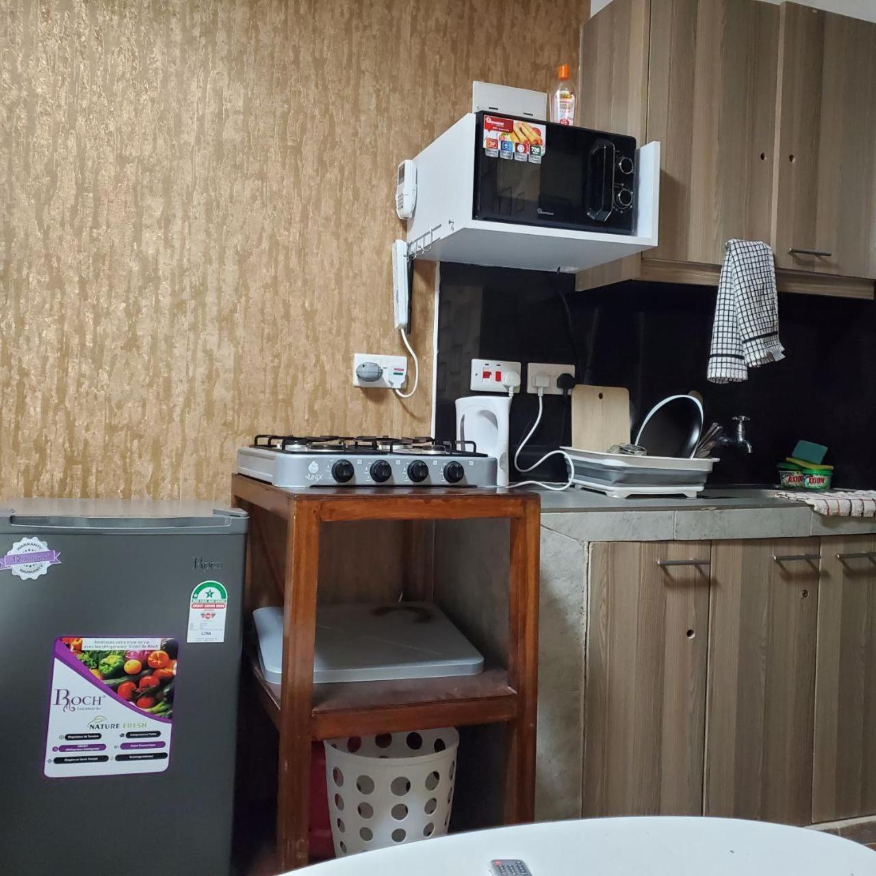 Lovely & Cozy Compact Studio Near Airport With Rooftop View Daire Nairobi Dış mekan fotoğraf