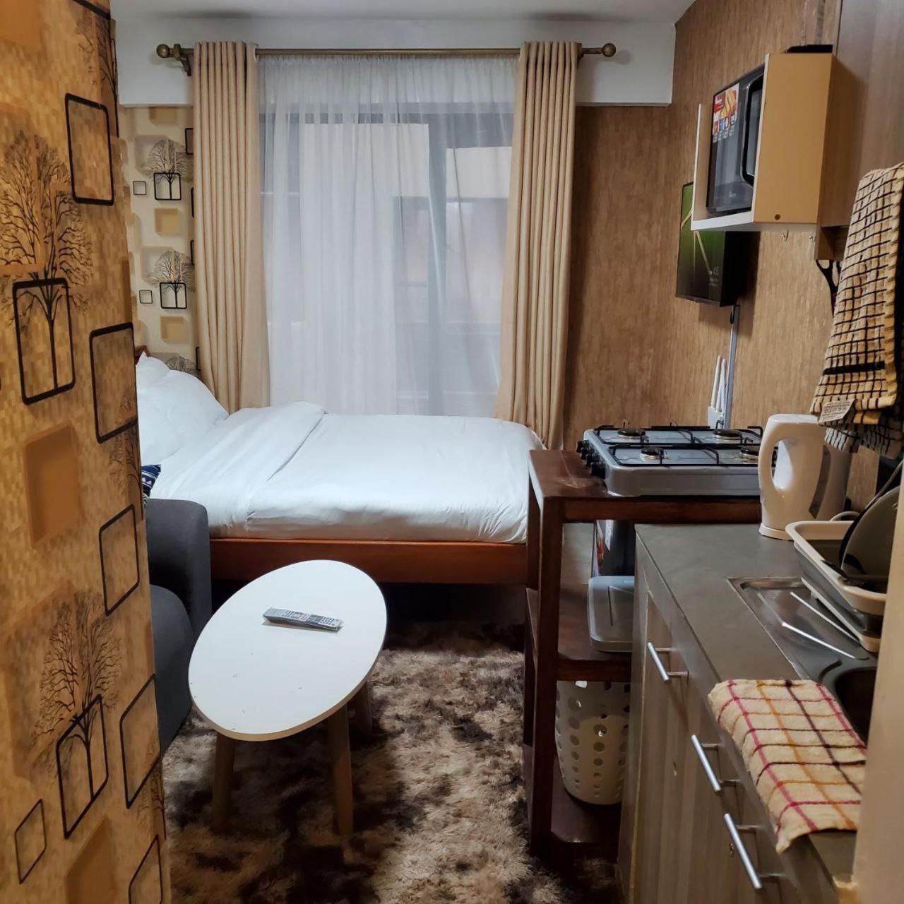Lovely & Cozy Compact Studio Near Airport With Rooftop View Daire Nairobi Dış mekan fotoğraf